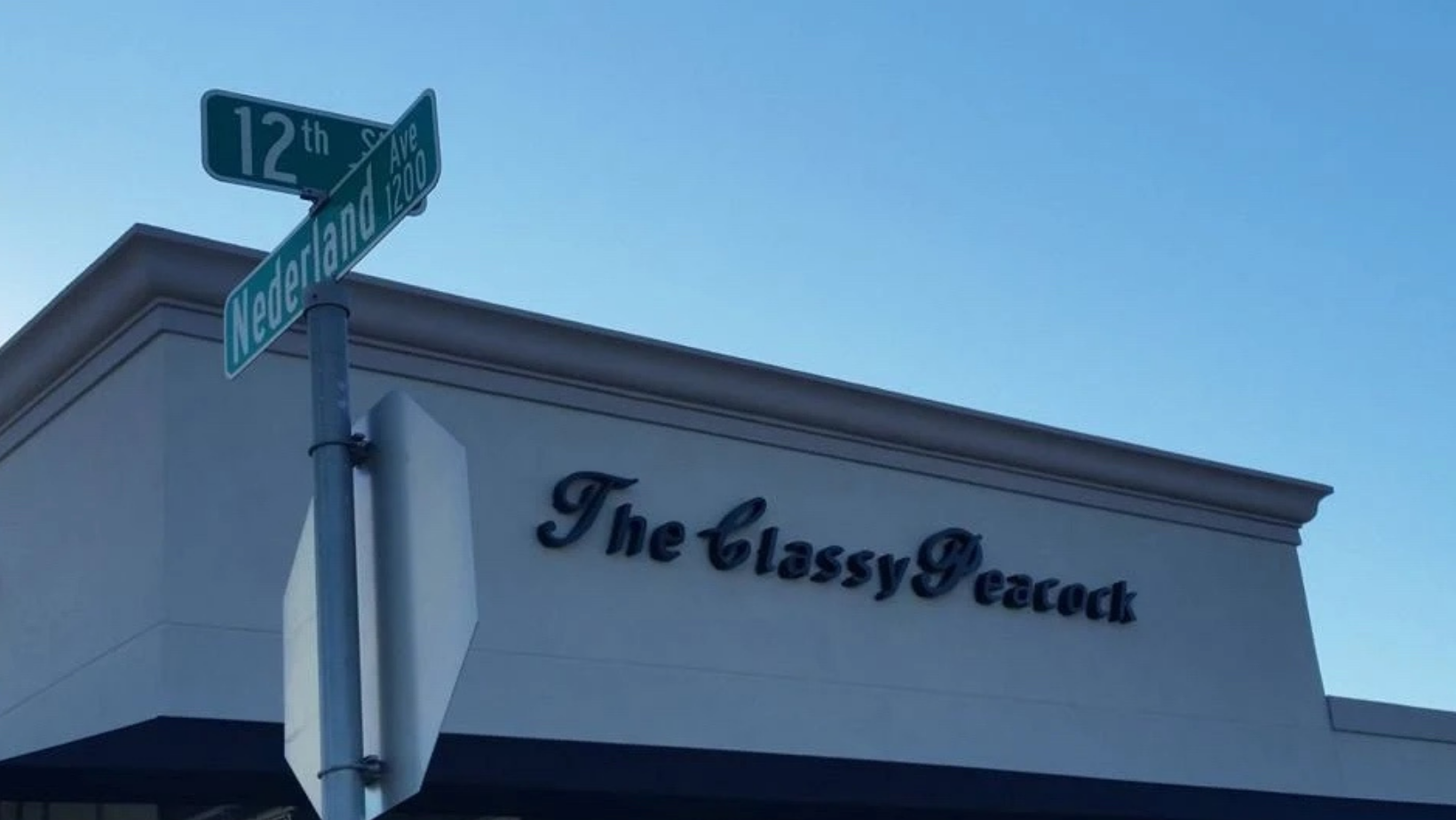 The Classy Peacock - Photo 2