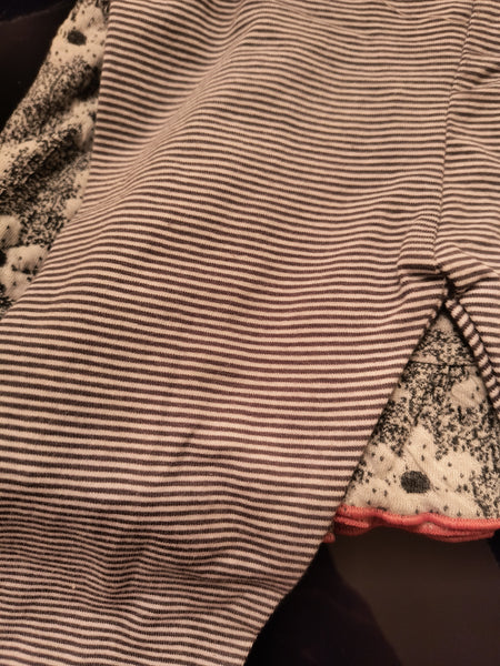 Close-up of a striped fabric leggings.