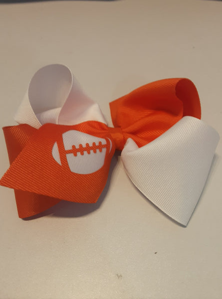 Orange & white football hair bow