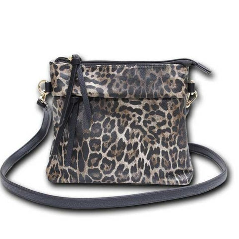 Leopard  print crossbody Marc Chantel bag with sip closure, 2 exterior zipping pockets, 2 interior pockets, 1 with a zipper and 1 without a zipper.